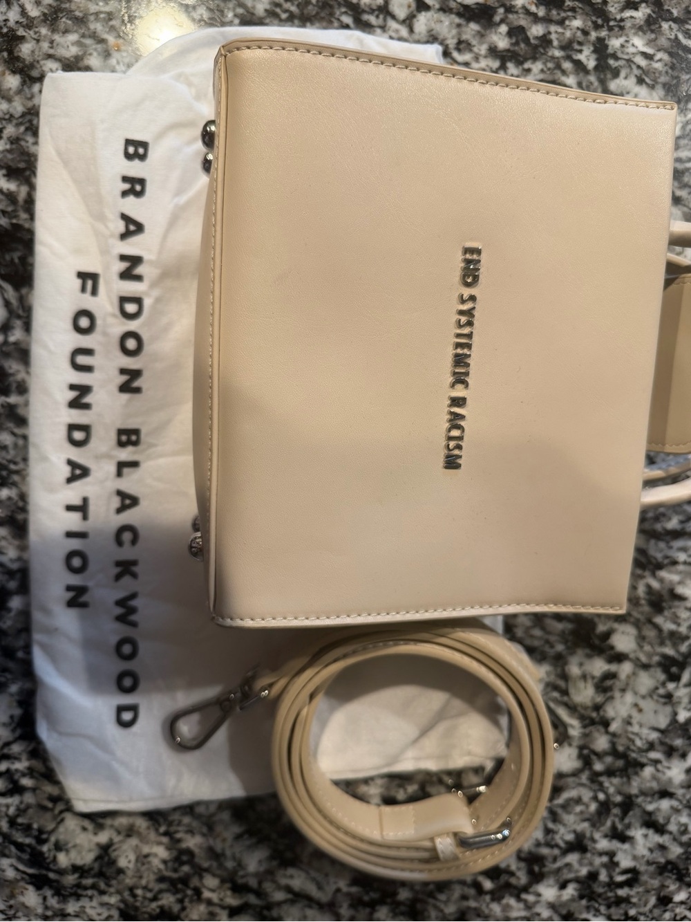 Brandon Blackwood Cream Crossbody Bag with 'End Systemic Racism' Plaque